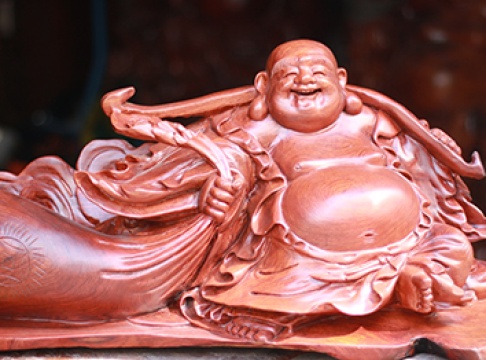 Phật di lặc kéo bao tiền gỗ Hương Gia Lai cao 32 ngang 67 sâu 23